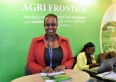 Fridah Gitau from Agri Frontier welcomed everyone at their booth. Agri Frontier helps businesses in agriculture grow and stay strong.